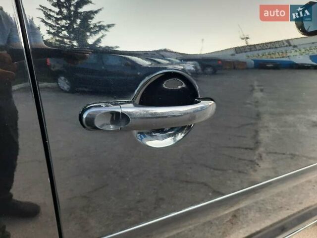 Черный Фольксваген Туран, объемом двигателя 1.6 л и пробегом 213 тыс. км за 8550 $, фото 135 на Automoto.ua