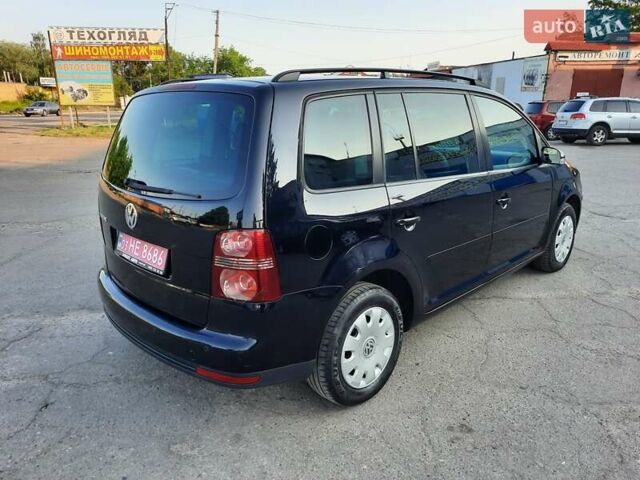 Черный Фольксваген Туран, объемом двигателя 1.6 л и пробегом 213 тыс. км за 8550 $, фото 17 на Automoto.ua
