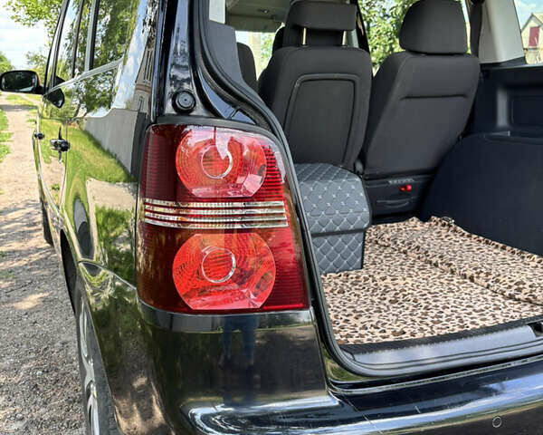 Черный Фольксваген Туран, объемом двигателя 1.39 л и пробегом 191 тыс. км за 8500 $, фото 17 на Automoto.ua