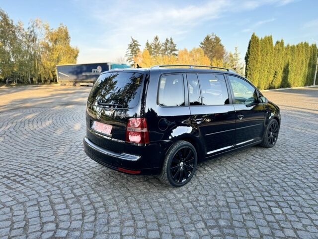 Черный Фольксваген Туран, объемом двигателя 1.4 л и пробегом 200 тыс. км за 7300 $, фото 4 на Automoto.ua