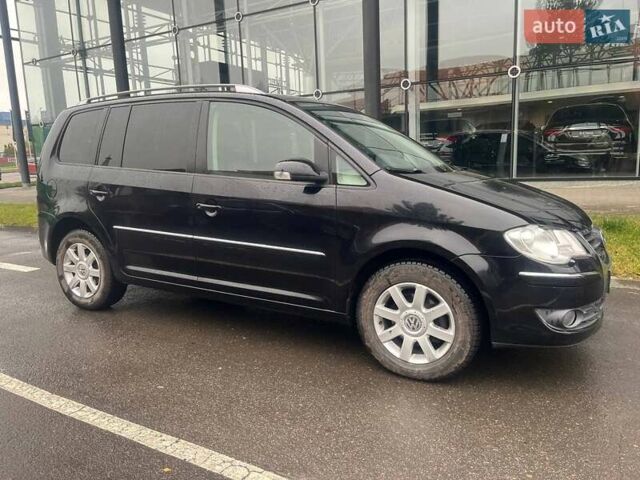 Черный Фольксваген Туран, объемом двигателя 2 л и пробегом 208 тыс. км за 7771 $, фото 4 на Automoto.ua