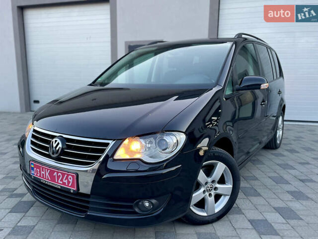 Чорний Фольксваген Туран, об'ємом двигуна 2 л та пробігом 292 тис. км за 8999 $, фото 25 на Automoto.ua