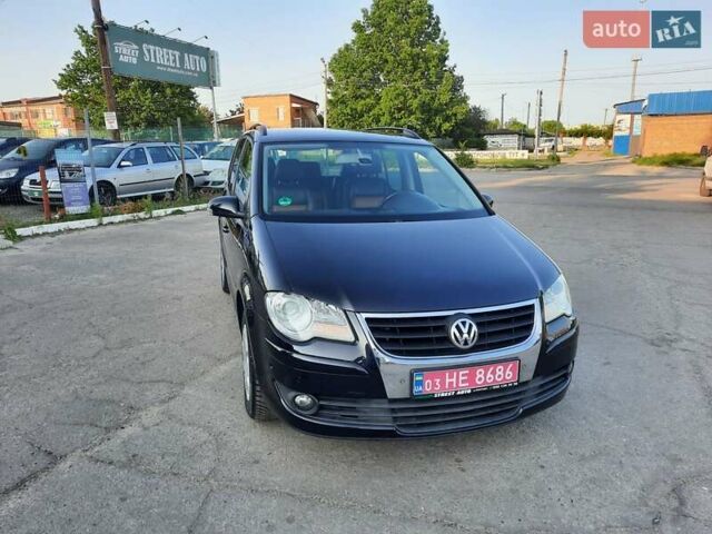 Черный Фольксваген Туран, объемом двигателя 1.6 л и пробегом 213 тыс. км за 8550 $, фото 2 на Automoto.ua