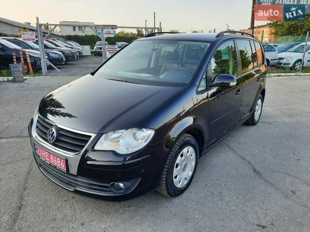 Черный Фольксваген Туран, объемом двигателя 1.6 л и пробегом 213 тыс. км за 8550 $, фото 153 на Automoto.ua