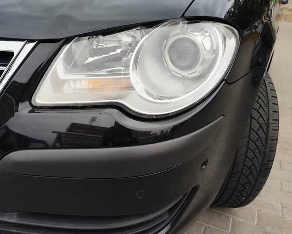 Чорний Фольксваген Туран, об'ємом двигуна 1.4 л та пробігом 194 тис. км за 6600 $, фото 50 на Automoto.ua