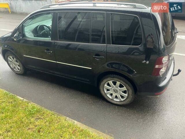 Черный Фольксваген Туран, объемом двигателя 2 л и пробегом 208 тыс. км за 7771 $, фото 10 на Automoto.ua