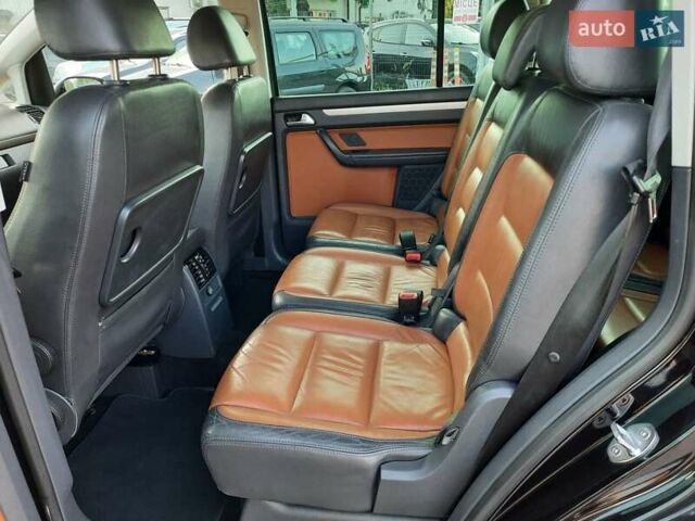 Черный Фольксваген Туран, объемом двигателя 1.6 л и пробегом 213 тыс. км за 8550 $, фото 79 на Automoto.ua