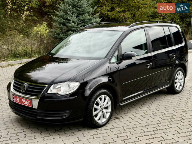 Черный Фольксваген Туран, объемом двигателя 1.6 л и пробегом 200 тыс. км за 7700 $, фото 2 на Automoto.ua