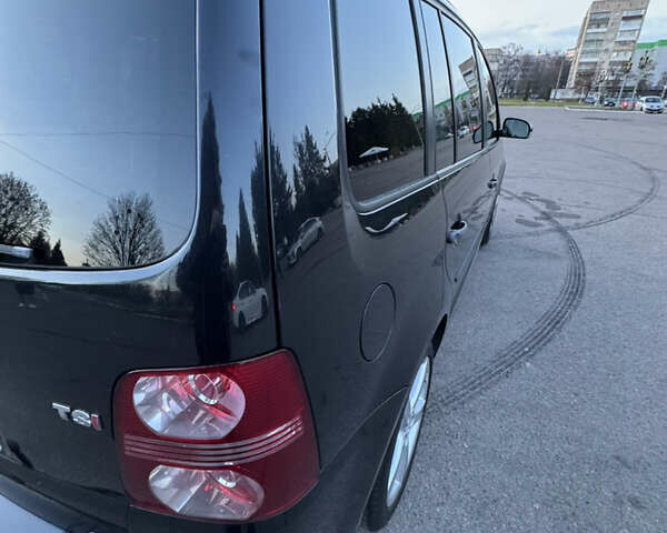 Черный Фольксваген Туран, объемом двигателя 1.4 л и пробегом 224 тыс. км за 6499 $, фото 11 на Automoto.ua