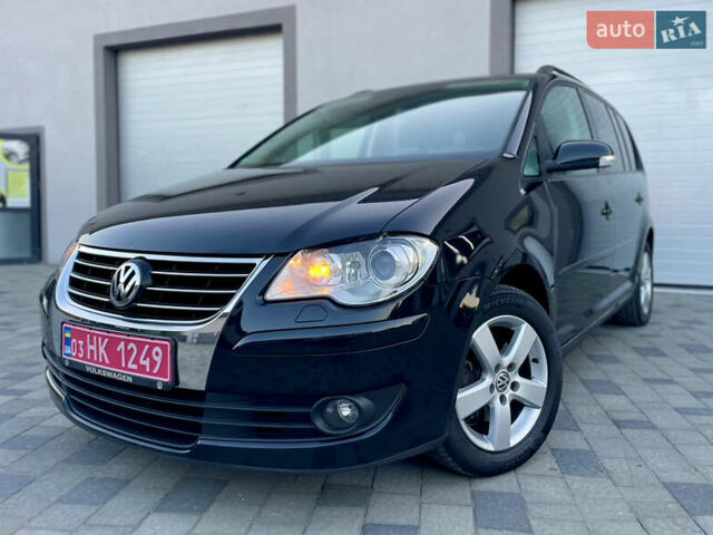 Чорний Фольксваген Туран, об'ємом двигуна 2 л та пробігом 292 тис. км за 8999 $, фото 22 на Automoto.ua