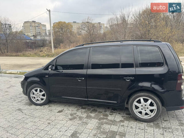 Черный Фольксваген Туран, объемом двигателя 1.4 л и пробегом 247 тыс. км за 7500 $, фото 8 на Automoto.ua