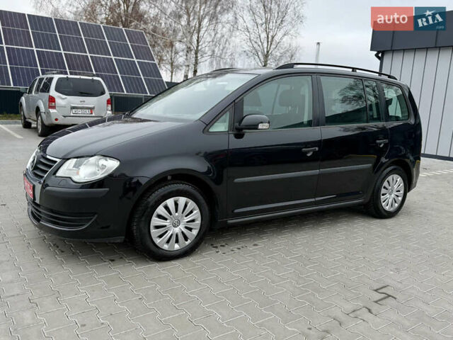 Черный Фольксваген Туран, объемом двигателя 1.4 л и пробегом 227 тыс. км за 7200 $, фото 7 на Automoto.ua