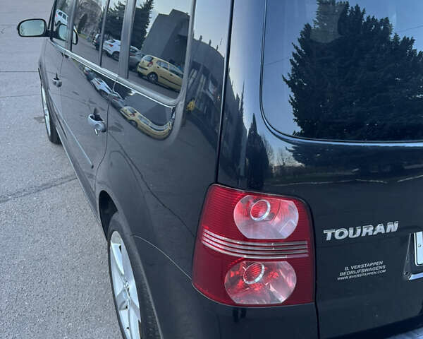 Черный Фольксваген Туран, объемом двигателя 1.4 л и пробегом 224 тыс. км за 6499 $, фото 10 на Automoto.ua