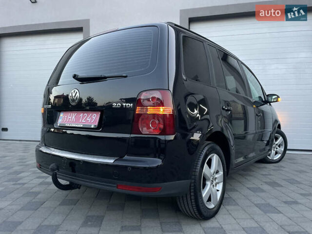 Чорний Фольксваген Туран, об'ємом двигуна 2 л та пробігом 292 тис. км за 8999 $, фото 42 на Automoto.ua