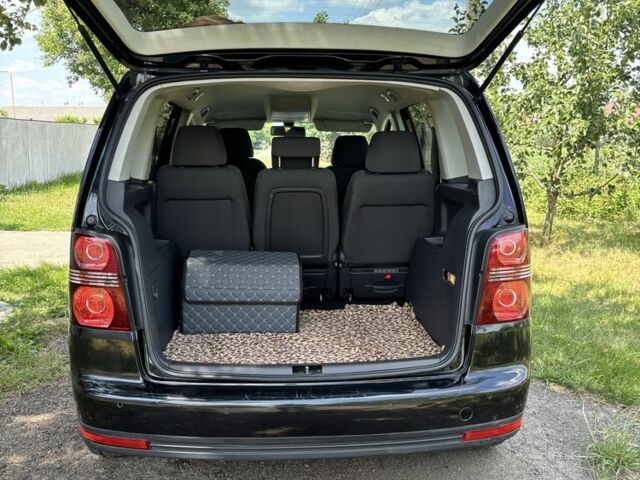 Черный Фольксваген Туран, объемом двигателя 1.4 л и пробегом 191 тыс. км за 8500 $, фото 3 на Automoto.ua