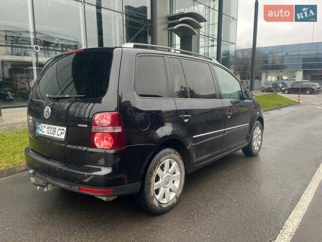 Черный Фольксваген Туран, объемом двигателя 2 л и пробегом 208 тыс. км за 7771 $, фото 7 на Automoto.ua