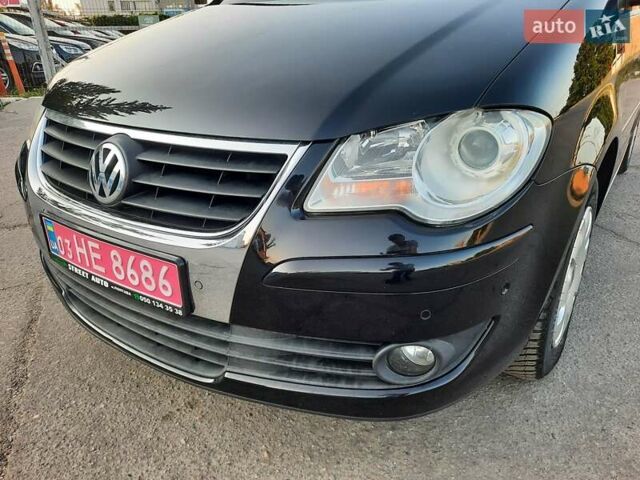Черный Фольксваген Туран, объемом двигателя 1.6 л и пробегом 213 тыс. км за 8550 $, фото 35 на Automoto.ua