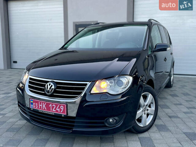 Чорний Фольксваген Туран, об'ємом двигуна 2 л та пробігом 292 тис. км за 8999 $, фото 21 на Automoto.ua