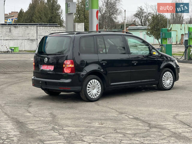 Черный Фольксваген Туран, объемом двигателя 1.6 л и пробегом 193 тыс. км за 7799 $, фото 16 на Automoto.ua