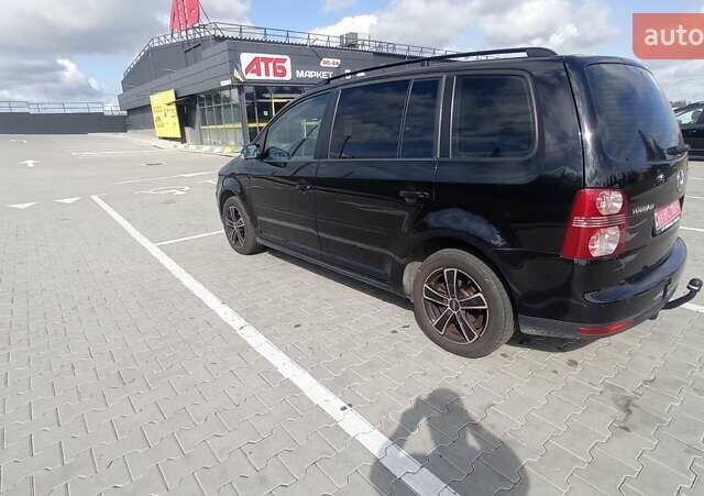 Чорний Фольксваген Туран, об'ємом двигуна 1.4 л та пробігом 216 тис. км за 7800 $, фото 42 на Automoto.ua