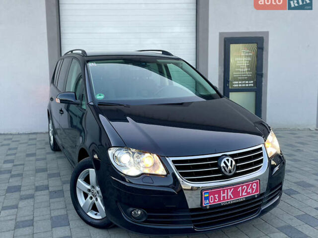 Чорний Фольксваген Туран, об'ємом двигуна 2 л та пробігом 292 тис. км за 8999 $, фото 4 на Automoto.ua