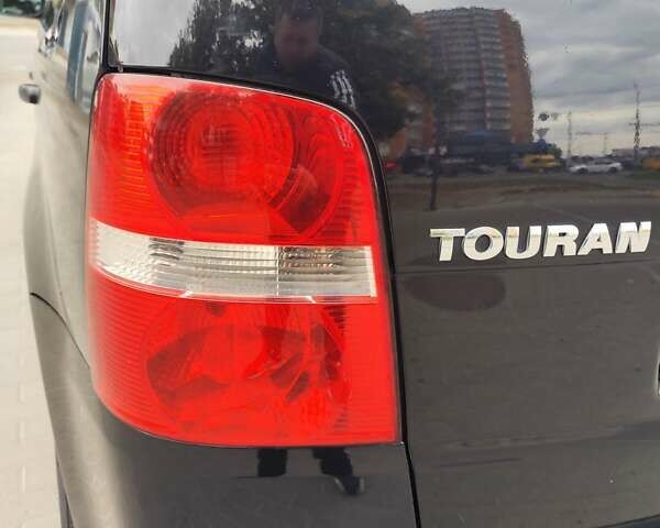 Чорний Фольксваген Туран, об'ємом двигуна 1.4 л та пробігом 194 тис. км за 6600 $, фото 44 на Automoto.ua