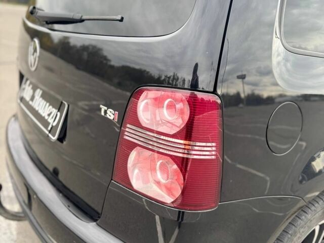 Черный Фольксваген Туран, объемом двигателя 1.4 л и пробегом 211 тыс. км за 7100 $, фото 5 на Automoto.ua