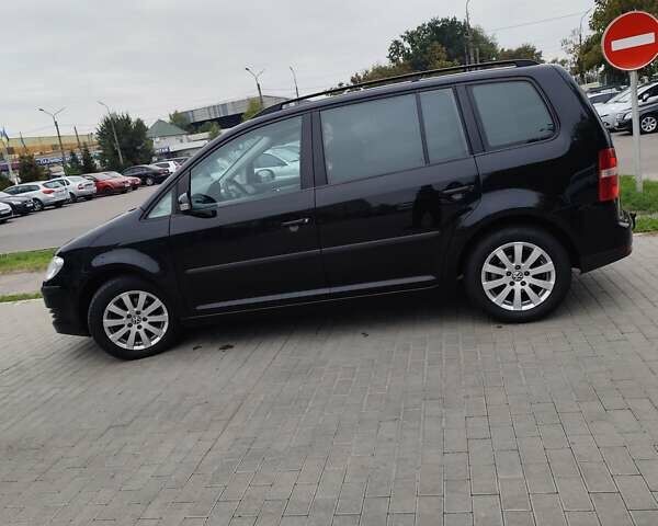 Чорний Фольксваген Туран, об'ємом двигуна 1.4 л та пробігом 194 тис. км за 6600 $, фото 2 на Automoto.ua