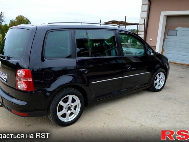 Черный Фольксваген Туран, объемом двигателя 2 л и пробегом 268 тыс. км за 2400 $, фото 4 на Automoto.ua