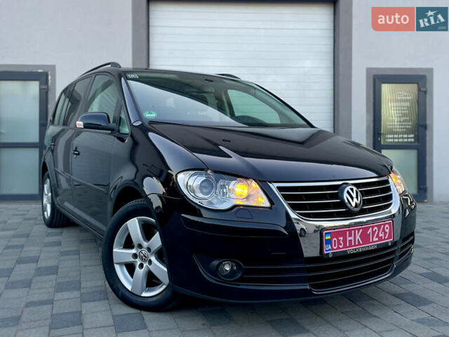 Чорний Фольксваген Туран, об'ємом двигуна 2 л та пробігом 292 тис. км за 8999 $, фото 9 на Automoto.ua