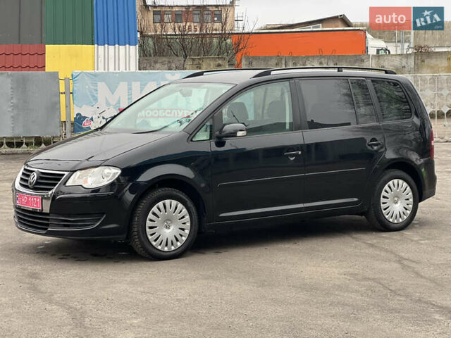 Черный Фольксваген Туран, объемом двигателя 1.6 л и пробегом 193 тыс. км за 7799 $, фото 5 на Automoto.ua