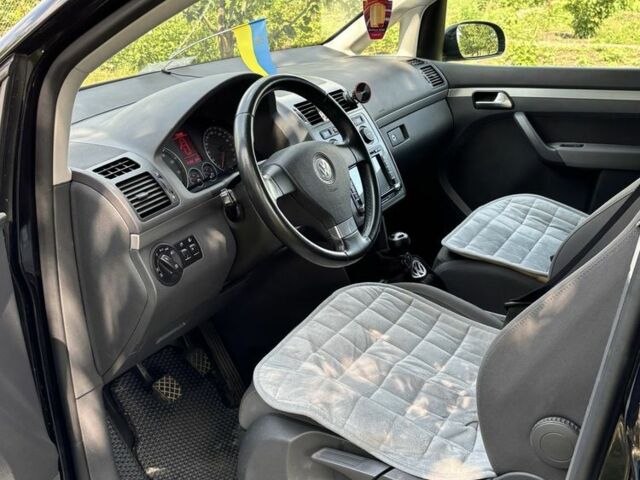 Черный Фольксваген Туран, объемом двигателя 1.4 л и пробегом 191 тыс. км за 8500 $, фото 9 на Automoto.ua