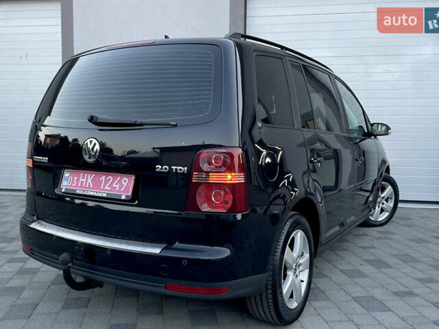Чорний Фольксваген Туран, об'ємом двигуна 2 л та пробігом 292 тис. км за 8999 $, фото 35 на Automoto.ua