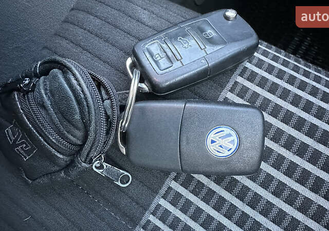 Чорний Фольксваген Туран, об'ємом двигуна 1.4 л та пробігом 145 тис. км за 8699 $, фото 50 на Automoto.ua