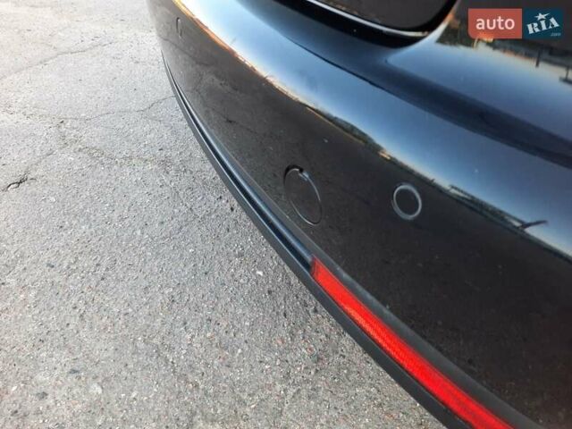 Черный Фольксваген Туран, объемом двигателя 1.6 л и пробегом 213 тыс. км за 8550 $, фото 110 на Automoto.ua