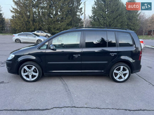 Черный Фольксваген Туран, объемом двигателя 1.4 л и пробегом 224 тыс. км за 6499 $, фото 2 на Automoto.ua