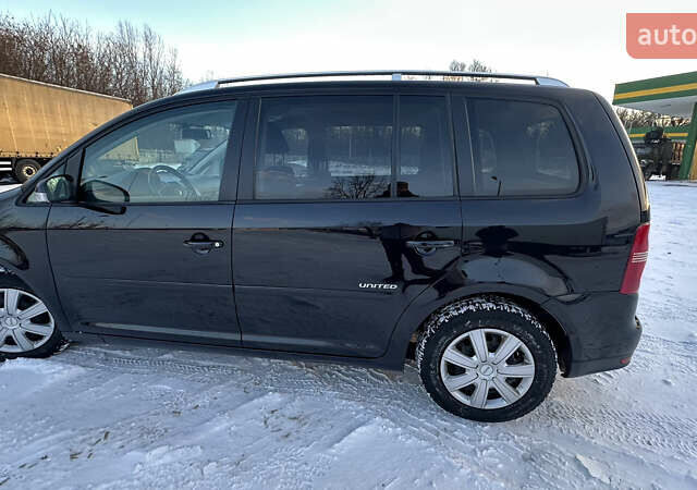 Чорний Фольксваген Туран, об'ємом двигуна 1.4 л та пробігом 145 тис. км за 8699 $, фото 35 на Automoto.ua