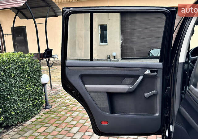 Черный Фольксваген Туран, объемом двигателя 1.6 л и пробегом 176 тыс. км за 8198 $, фото 77 на Automoto.ua