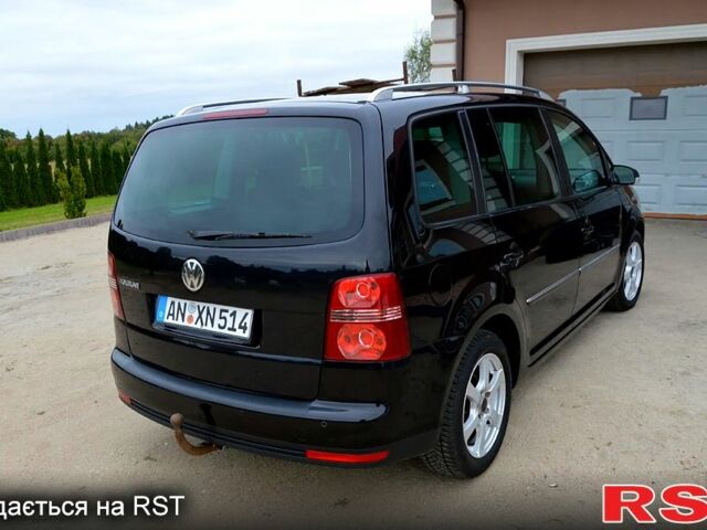 Черный Фольксваген Туран, объемом двигателя 2 л и пробегом 268 тыс. км за 2400 $, фото 3 на Automoto.ua
