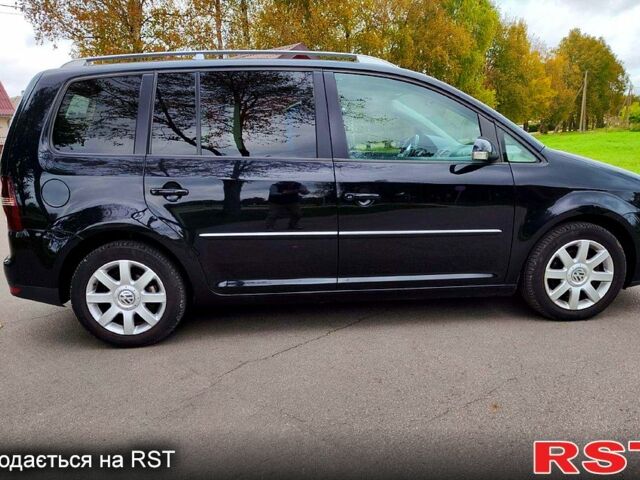 Черный Фольксваген Туран, объемом двигателя 2 л и пробегом 318 тыс. км за 2400 $, фото 4 на Automoto.ua