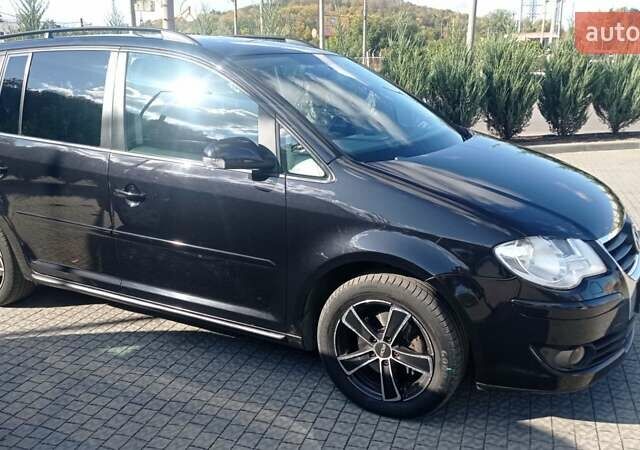 Чорний Фольксваген Туран, об'ємом двигуна 1.4 л та пробігом 216 тис. км за 7800 $, фото 39 на Automoto.ua
