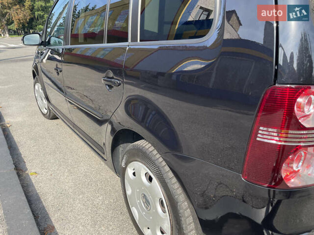 Чорний Фольксваген Туран, об'ємом двигуна 1.4 л та пробігом 192 тис. км за 7500 $, фото 5 на Automoto.ua