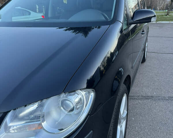 Черный Фольксваген Туран, объемом двигателя 1.4 л и пробегом 224 тыс. км за 6499 $, фото 9 на Automoto.ua