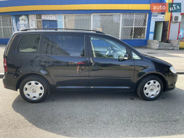 Чорний Фольксваген Туран, об'ємом двигуна 1.4 л та пробігом 192 тис. км за 7500 $, фото 2 на Automoto.ua