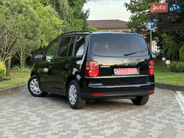 Черный Фольксваген Туран, объемом двигателя 1.6 л и пробегом 220 тыс. км за 7700 $, фото 2 на Automoto.ua