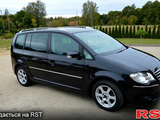 Черный Фольксваген Туран, объемом двигателя 2 л и пробегом 268 тыс. км за 2400 $, фото 5 на Automoto.ua