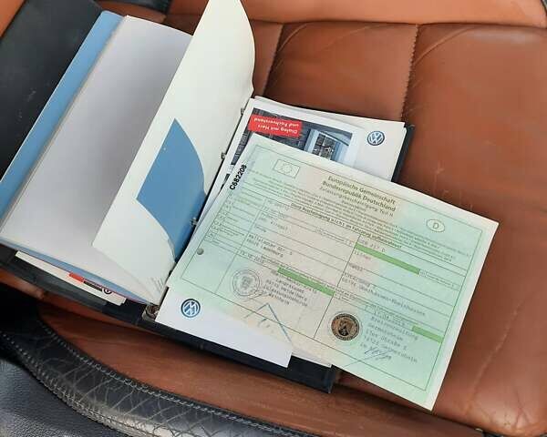 Черный Фольксваген Туран, объемом двигателя 1.6 л и пробегом 213 тыс. км за 8550 $, фото 148 на Automoto.ua