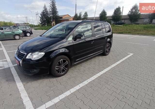 Чорний Фольксваген Туран, об'ємом двигуна 1.4 л та пробігом 216 тис. км за 7800 $, фото 43 на Automoto.ua