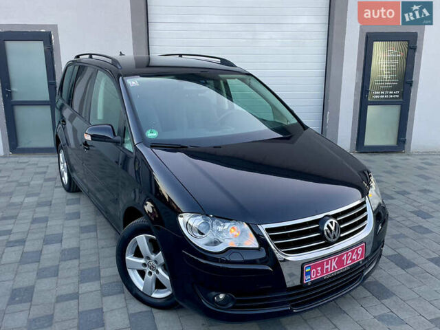 Чорний Фольксваген Туран, об'ємом двигуна 2 л та пробігом 292 тис. км за 8999 $, фото 10 на Automoto.ua