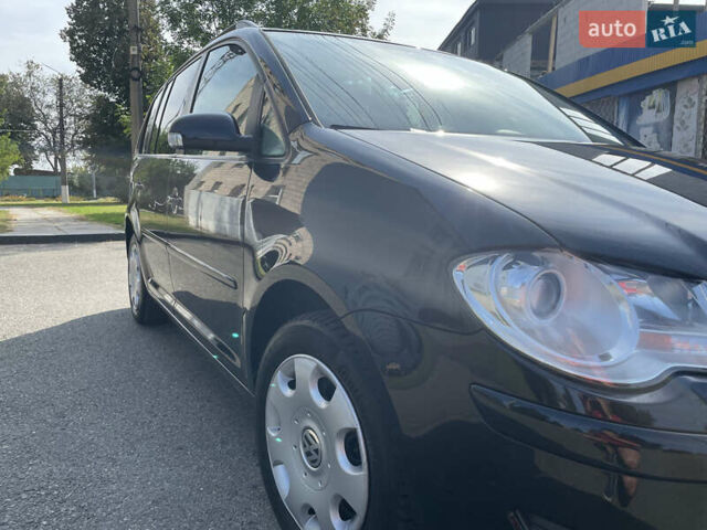 Чорний Фольксваген Туран, об'ємом двигуна 1.4 л та пробігом 192 тис. км за 7500 $, фото 3 на Automoto.ua